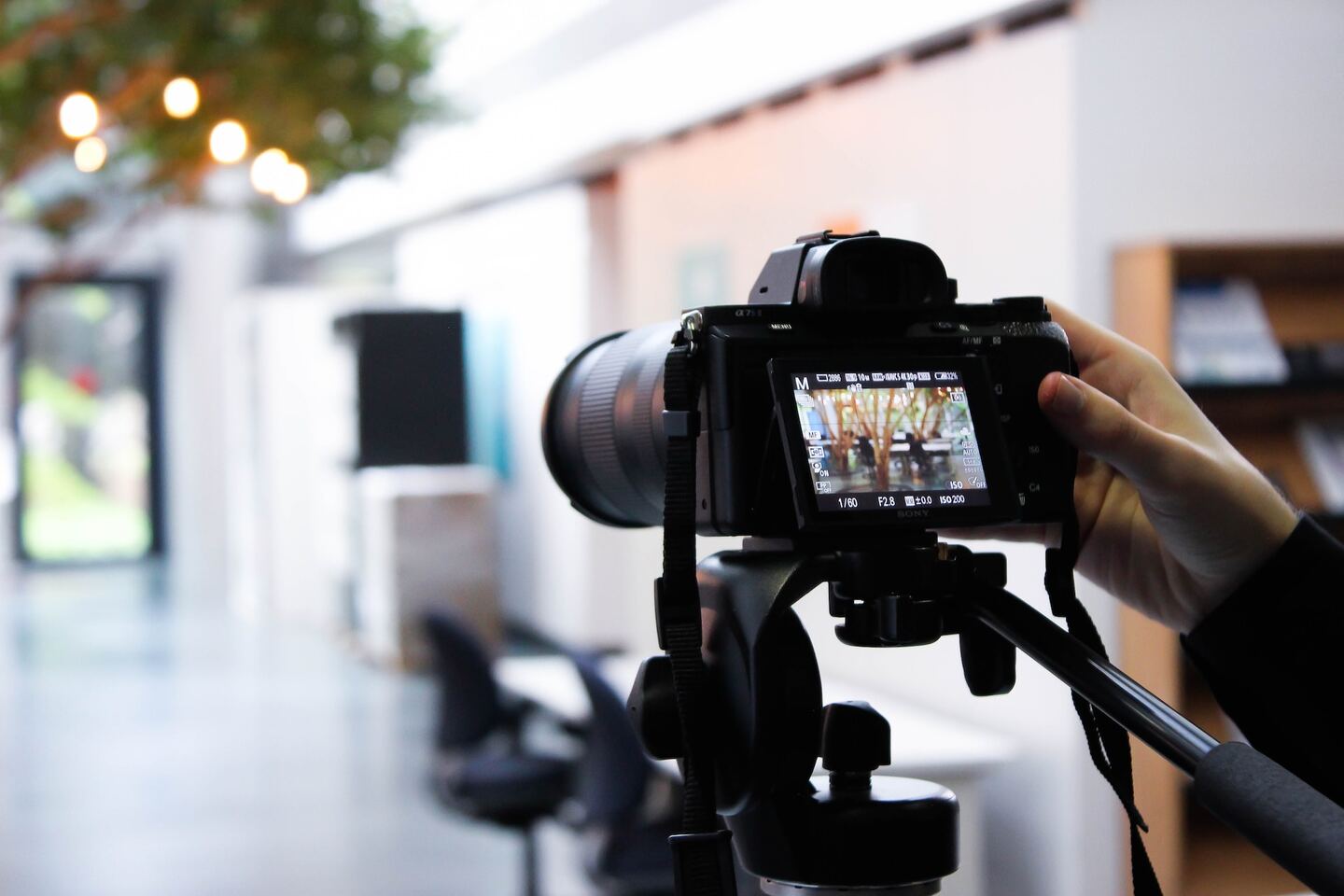 Real Estate Photographer Preparing Listing Shooting